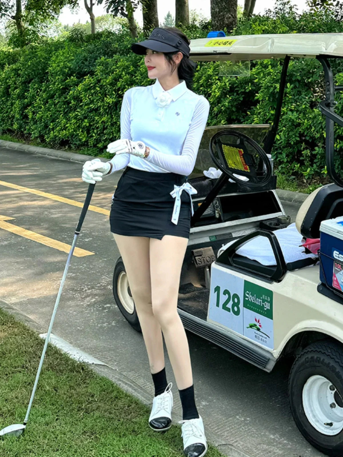 includes a women's slim-fit, long-sleeved golf set